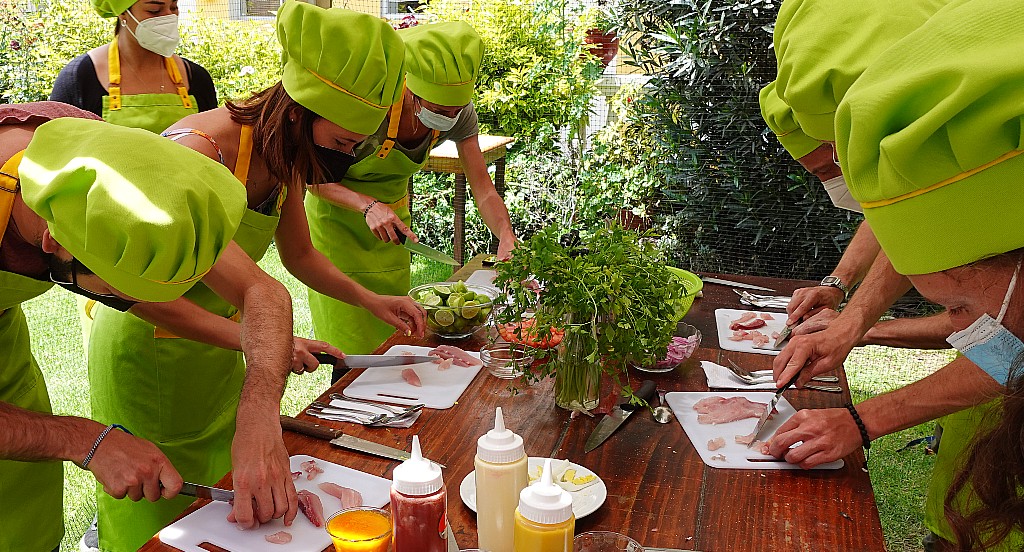 Travelers preparing Peruvian food in a hands-on cooking experience in Arequipa