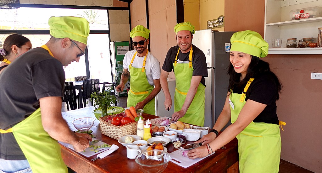 Bilingual instructors guiding a Peruvian cooking experience